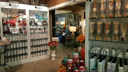 Fragrance and home goods display inside Keepers Interiors